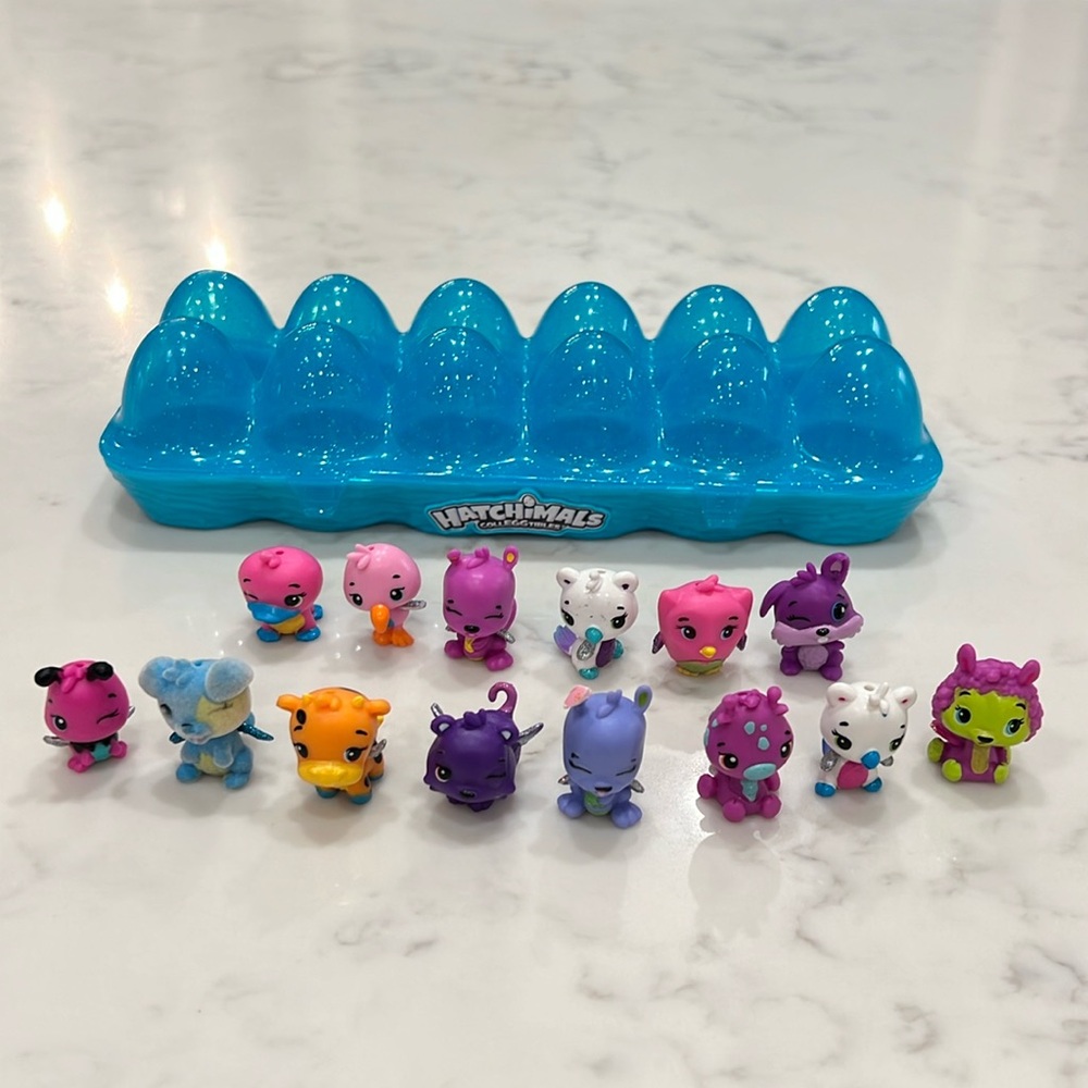 14 Hatchimals and egg container